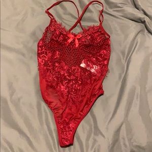 Deep red lace lingerie bodysuit
